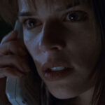 Neve Campbell nei panni di Sidney Prescott in "Scream" di Wes Craven (1996), qui recensito